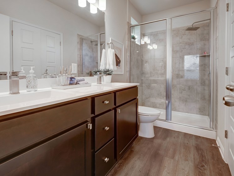 Standing showers and double bathroom vanities